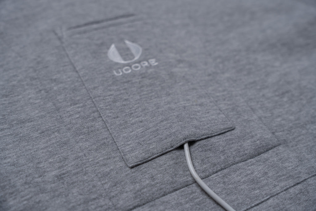 grey hoodie central pocket with headphone wire port