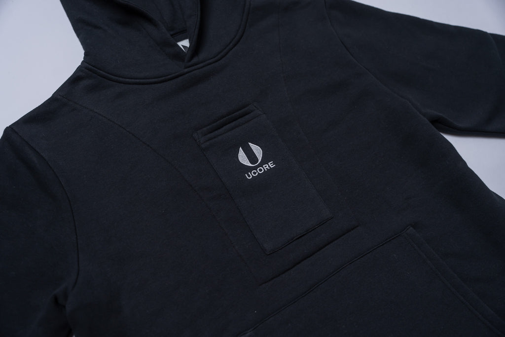 men's black hoodie designed by ucore with central phone pocket