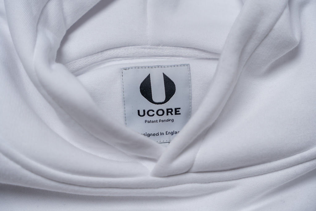 men's white hoodie close up of ucore label