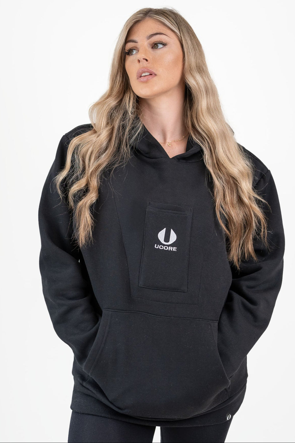 model wearing black hoodie by ucore