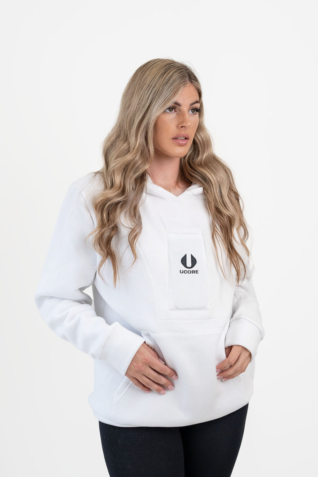 female model wearing white women's hoodie by ucore