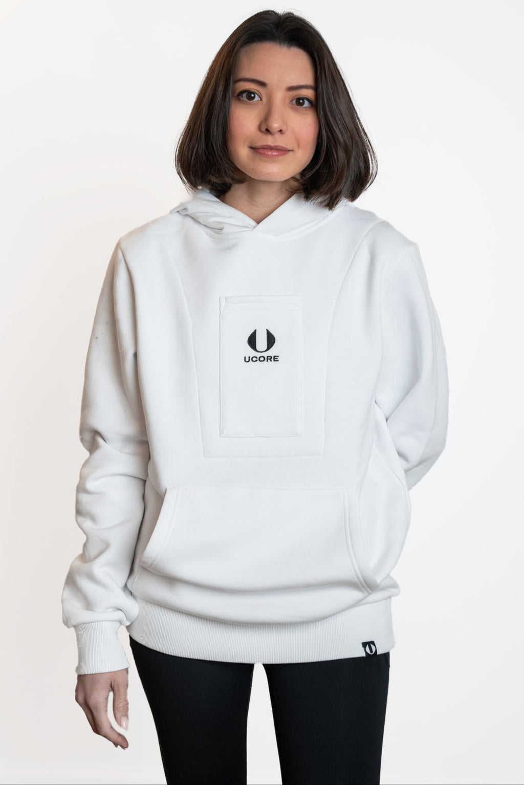 white women's ucore hoodie being worn by female model